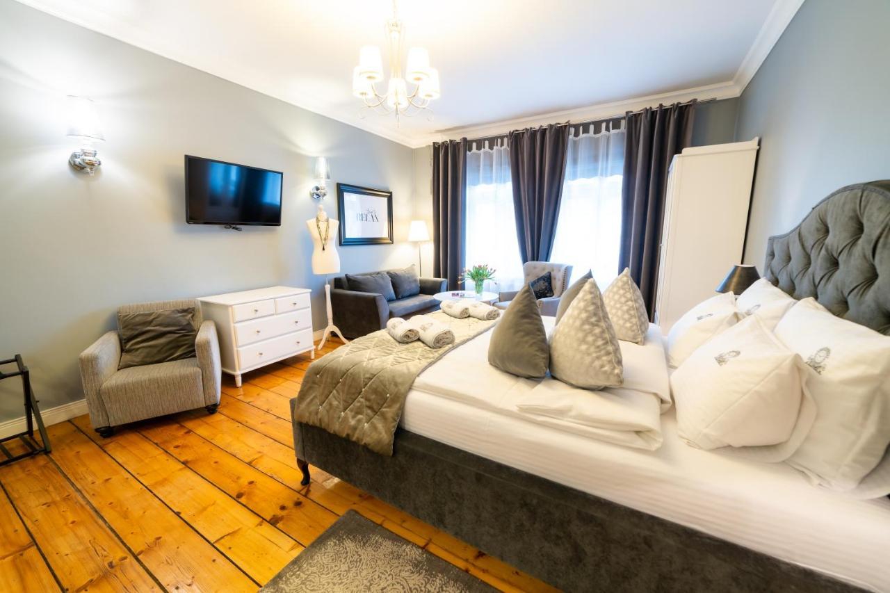 Apartamenty Pod Zegarem Mikołajki Esterno foto
