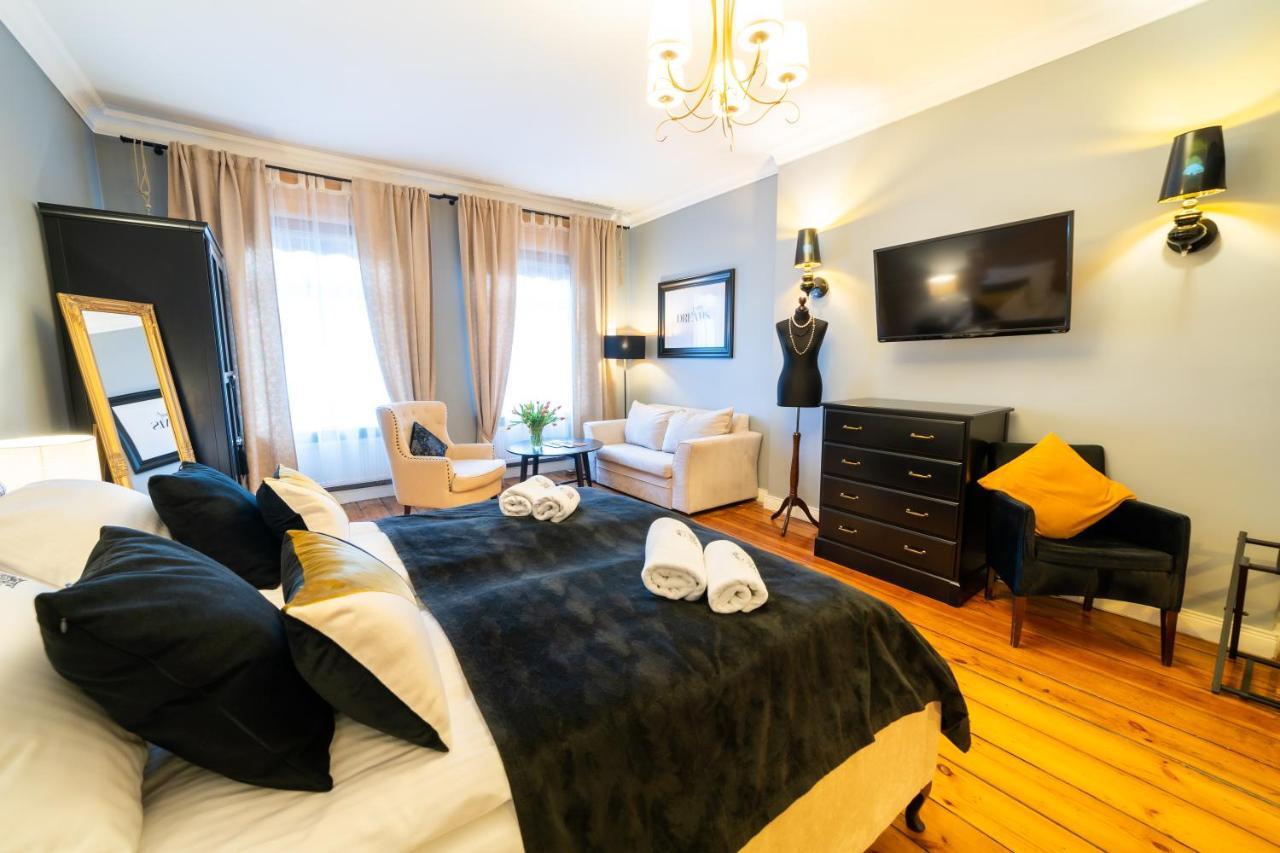 Apartamenty Pod Zegarem Mikołajki Esterno foto